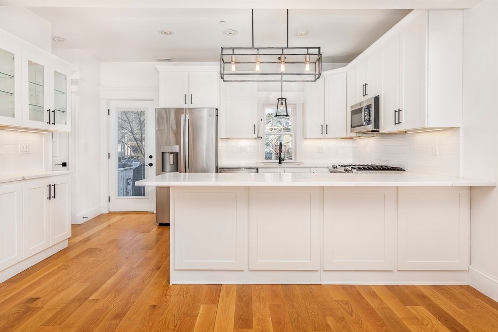 Interior, Kitchen, Pendant Lights, Recessed Lighting, Stainless Steel Appliances, Wood Texture Flooring