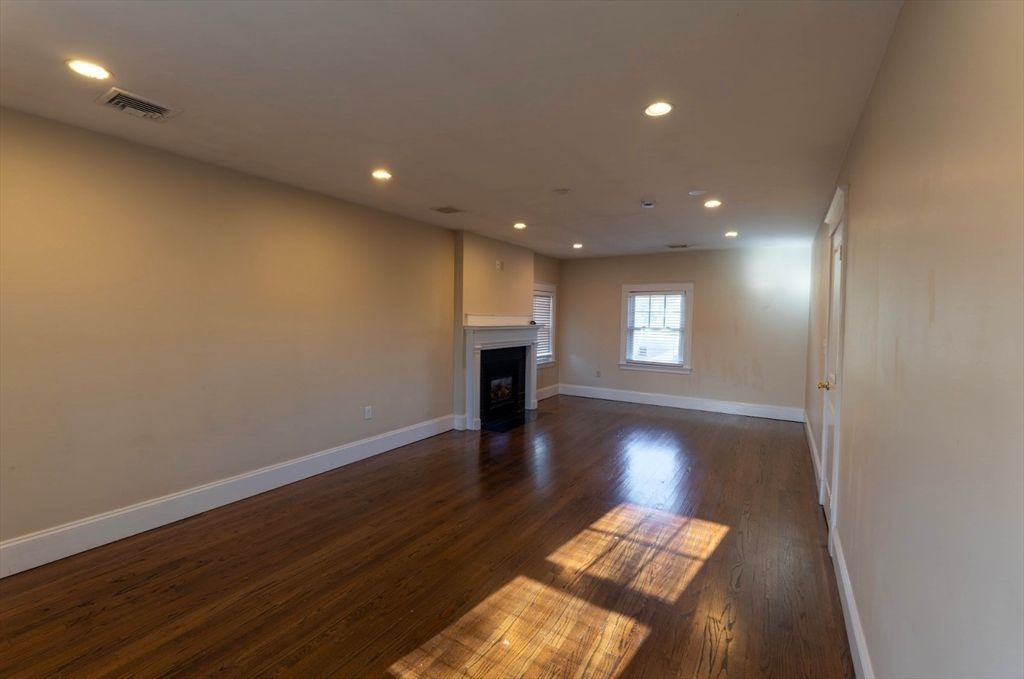 Empty room, Fireplace, Interior, Recessed Lighting, Wood Texture Flooring