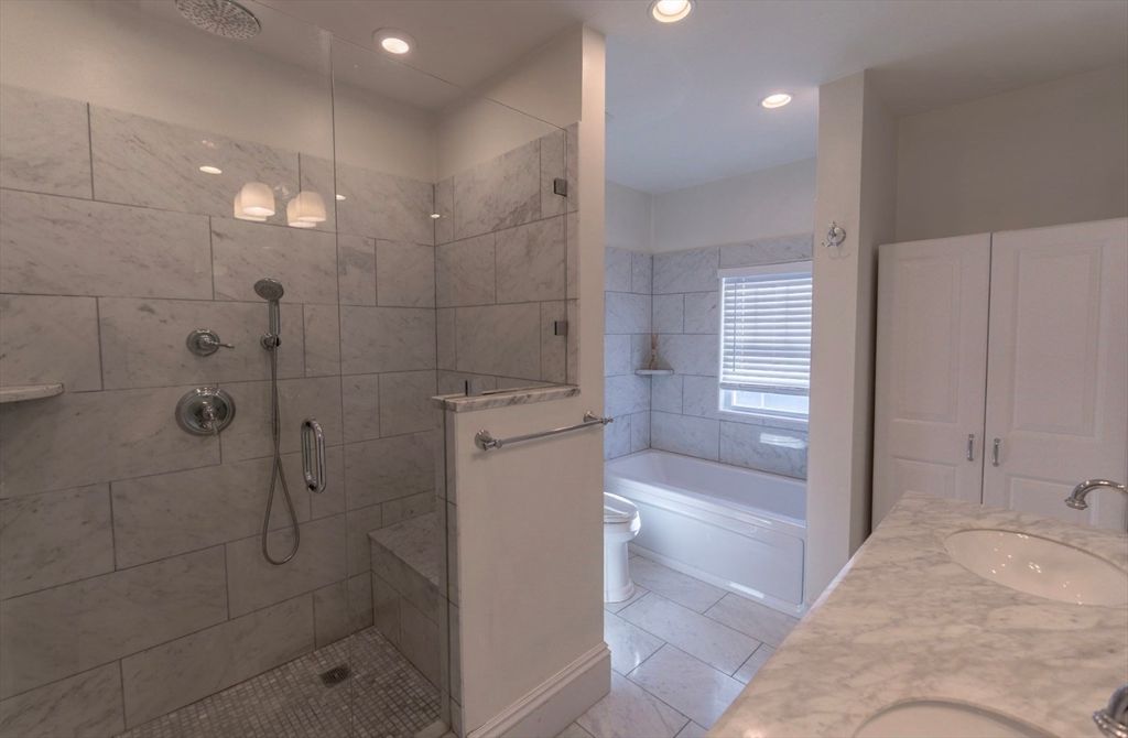 Bathroom, Dual Sink Vanities, Glass Shower, Interior, Marble Walls, Recessed Lighting