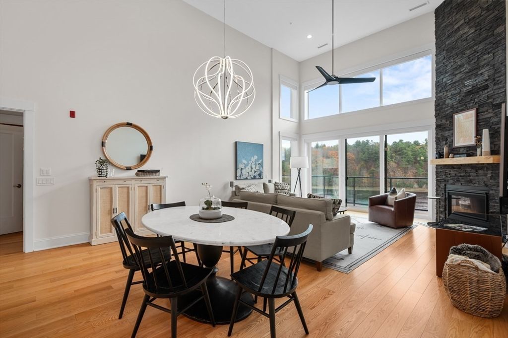 Dining room, Fireplace, Interior, Living room, Pendant Lights, Recessed Lighting, Wood Texture Flooring