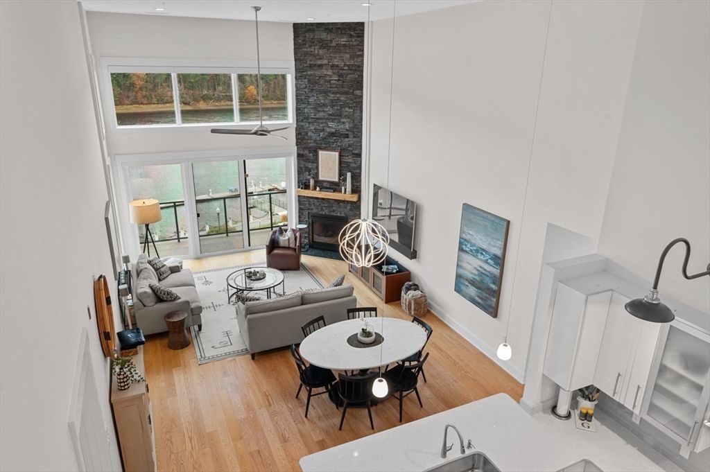 Dining room, Fireplace, Interior, Living room, Pendant Lights, Wood Texture Flooring