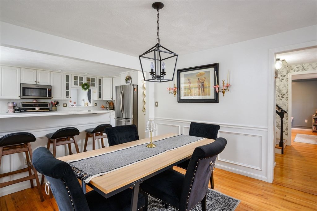 Dining room, Interior, Kitchen, Pendant Lights, Stainless Steel Appliances, Wood Texture Flooring