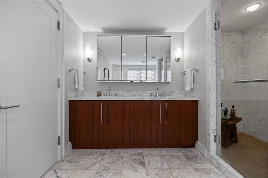 Bathroom, Dual Sink Vanities, Glass Shower, Interior, Marble, Marble Walls, Recessed Lighting