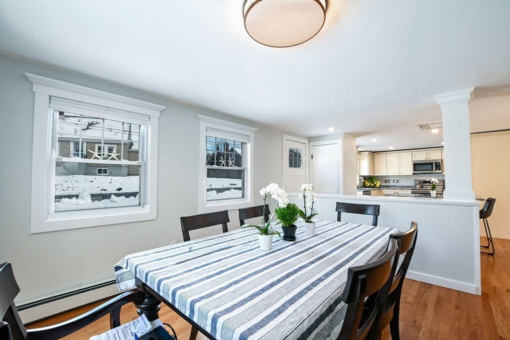 Dining room, Interior, Kitchen, Recessed Lighting, Stainless Steel Appliances, Wood Texture Flooring