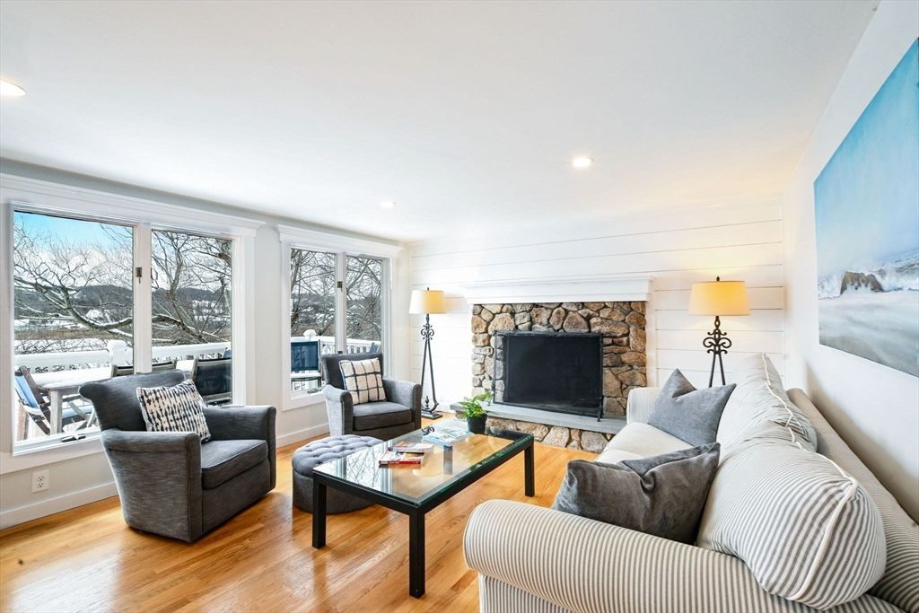 Fireplace, Interior, Living room, Recessed Lighting, Stone Walls, Wood Texture Flooring