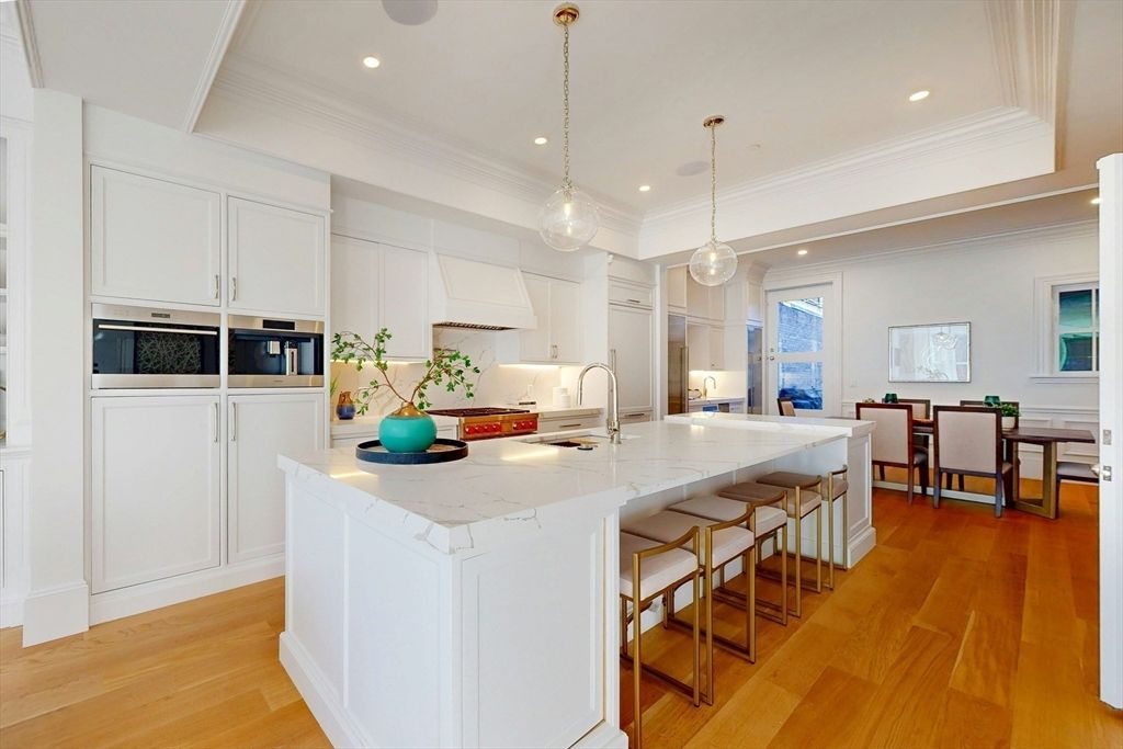 Dining room, Interior, Kitchen, Pendant Lights, Recessed Lighting, Stainless Steel Appliances, Wood Texture Flooring