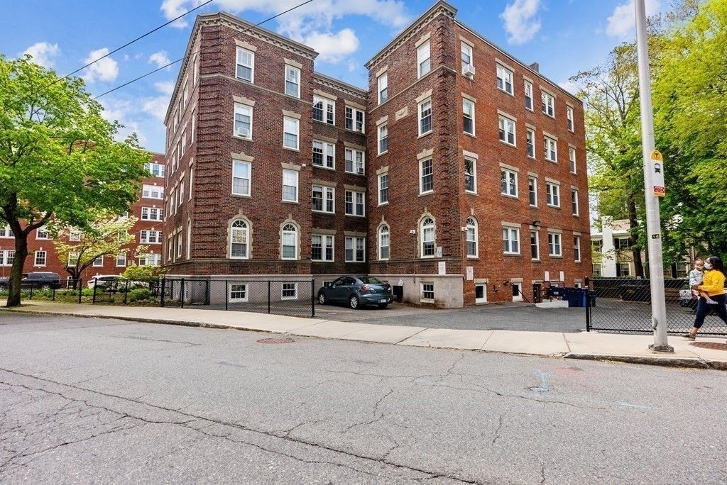 Exterior, Facade, Brick Facade, Condo Building