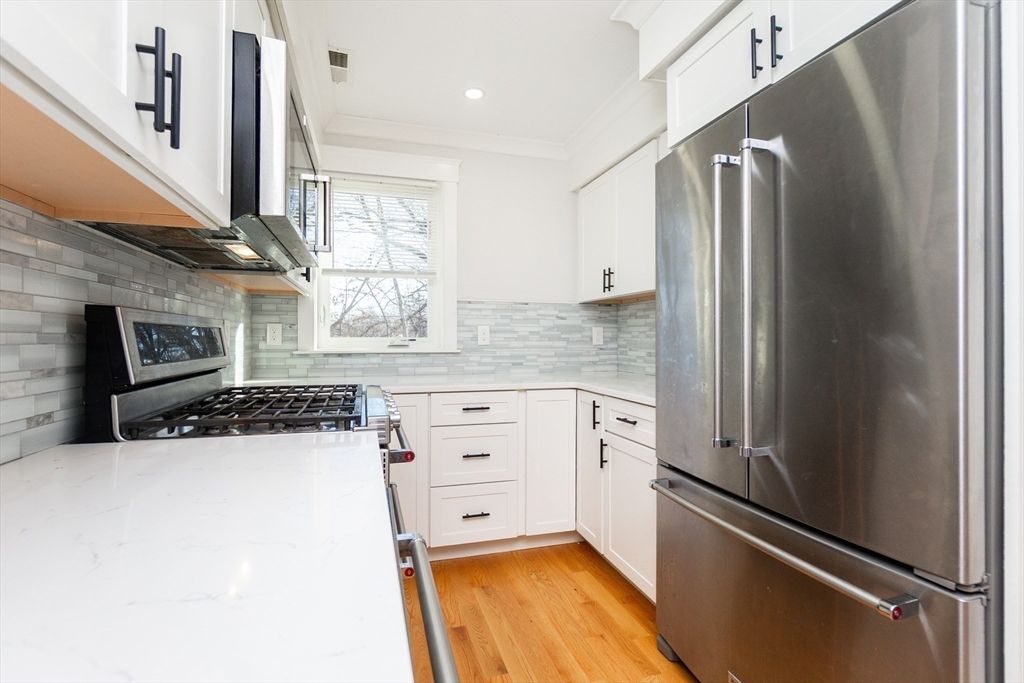 Interior, Kitchen, Recessed Lighting, Stainless Steel Appliances, Stone Walls, Wood Texture Flooring