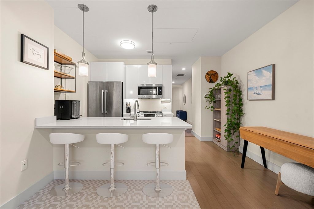 Interior, Kitchen, Pendant Lights, Recessed Lighting, Stainless Steel Appliances, Wood Texture Flooring