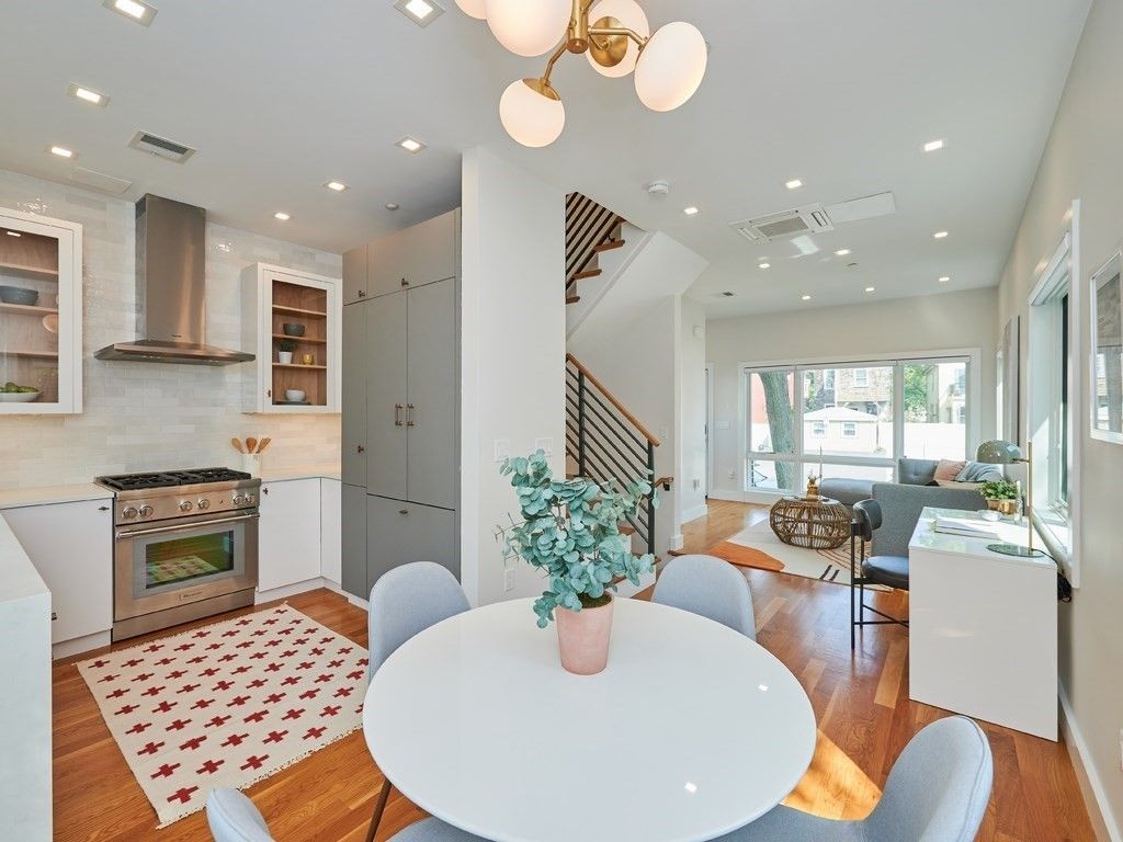 Dining room, Interior, Kitchen, Living room, Recessed Lighting, Stainless Steel Appliances, Wood Texture Flooring