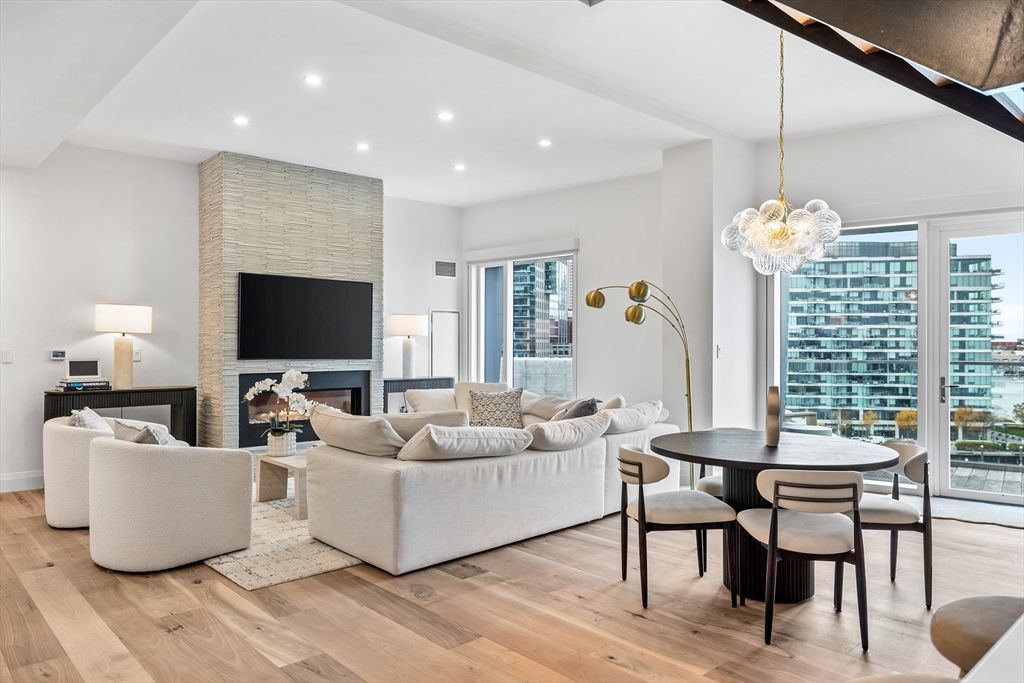 Dining room, Fireplace, Interior, Living room, Pendant Lights, Recessed Lighting, Wood Texture Flooring