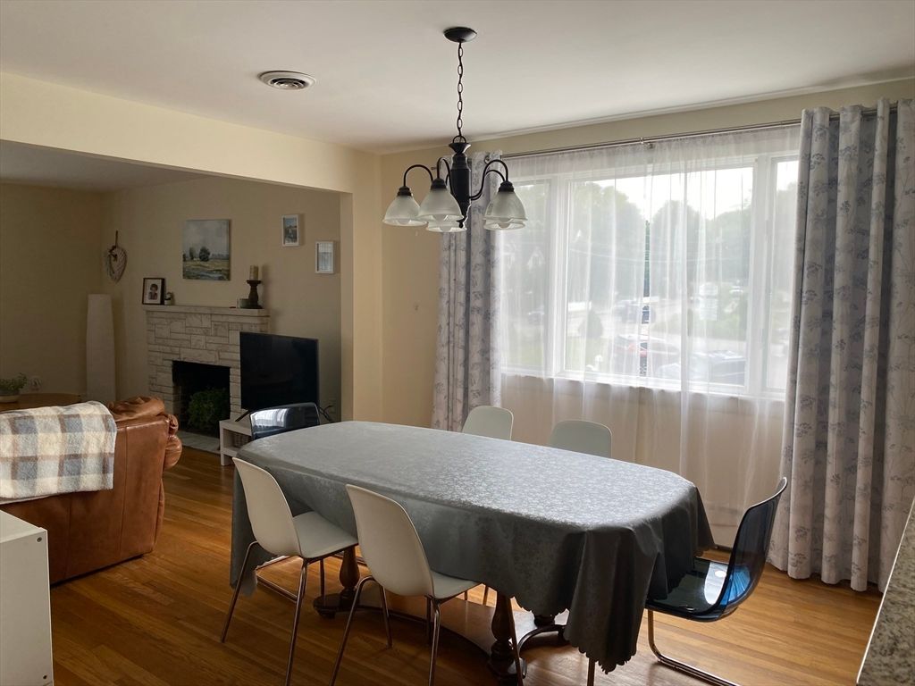 Chandelier, Dining room, Fireplace, Interior, Pendant Lights, Wood Texture Flooring