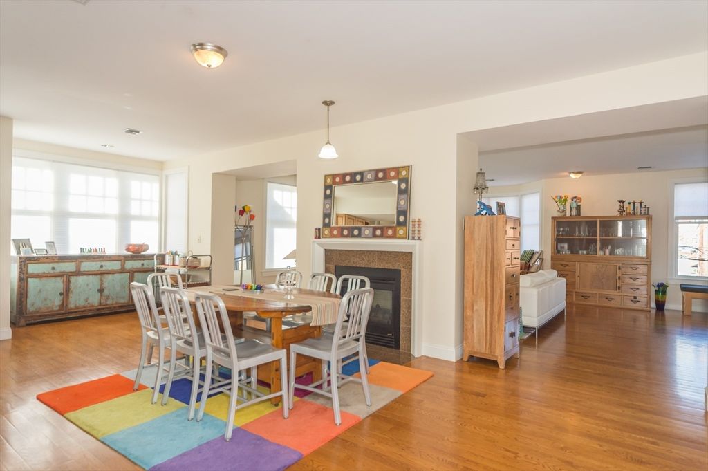 Dining room, Fireplace, Interior, Pendant Lights, Wood Texture Flooring