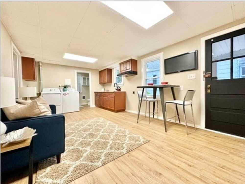 Dining room, Interior, Kitchen, Living room, Recessed Lighting, Washer, Wood Texture Flooring