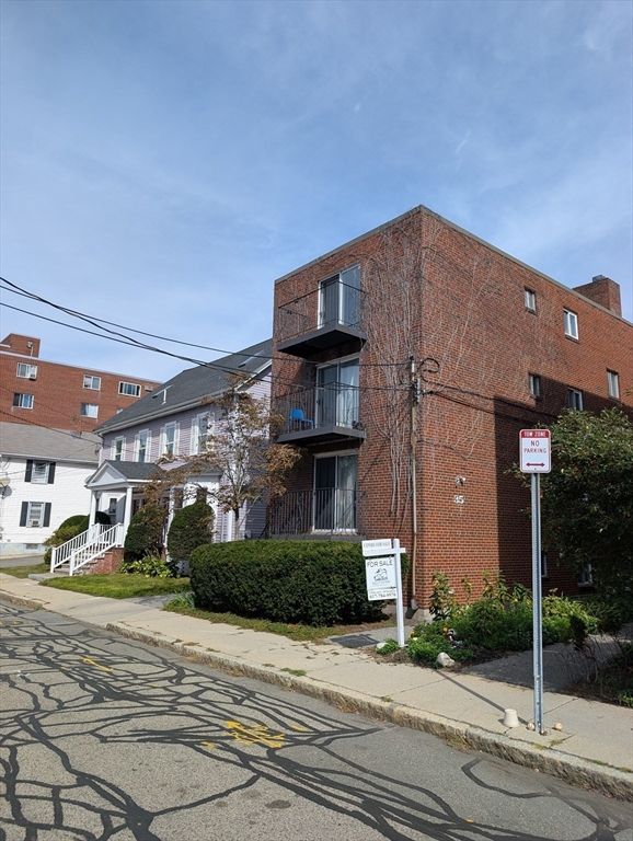 Exterior, Facade, Brick Facade, Condo Building