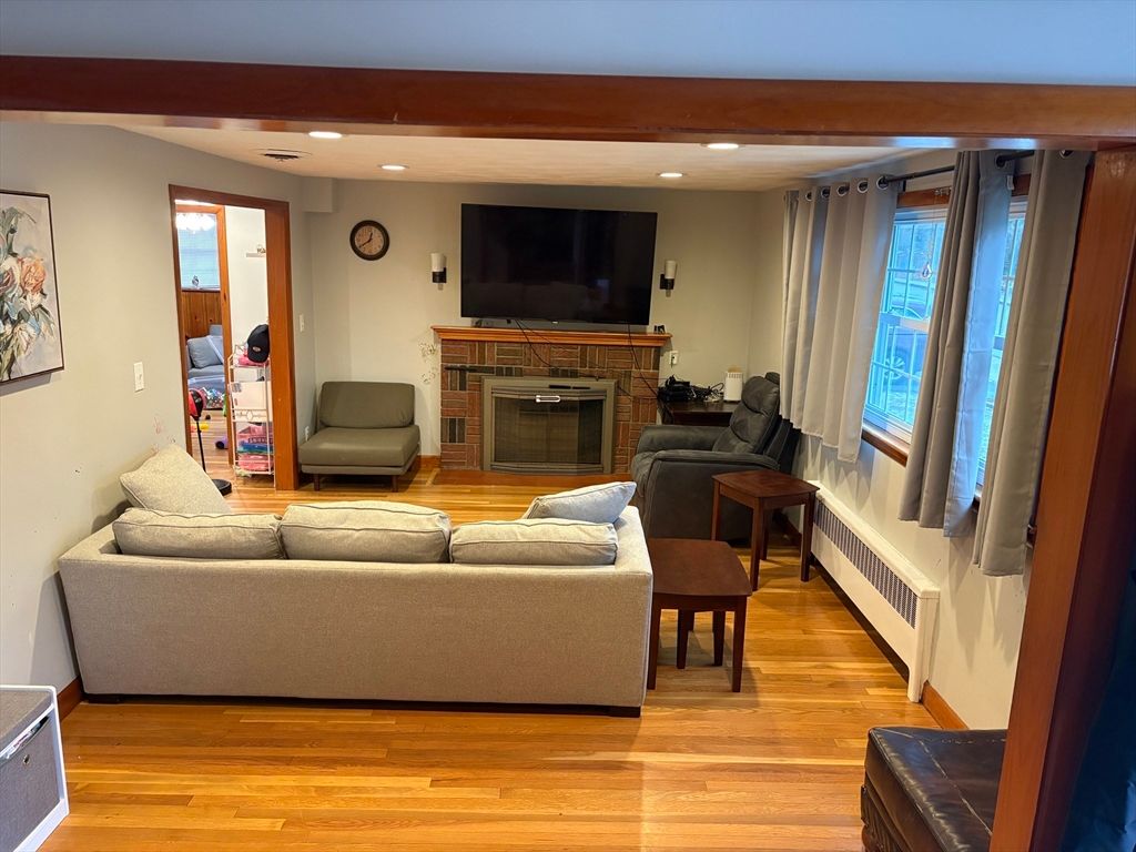 Fireplace, Interior, Living room, Recessed Lighting, Wood Texture Flooring