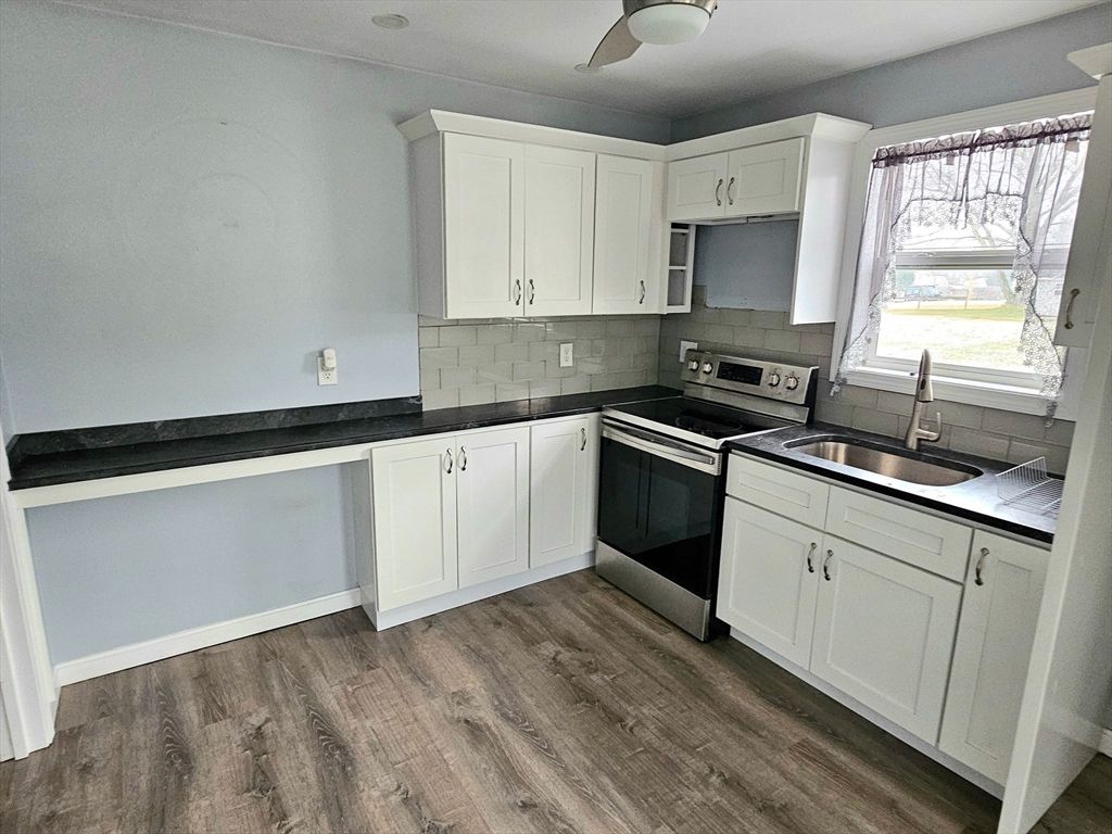 Interior, Kitchen, Stainless Steel Appliances, Tile Countertops, Wood Texture Flooring