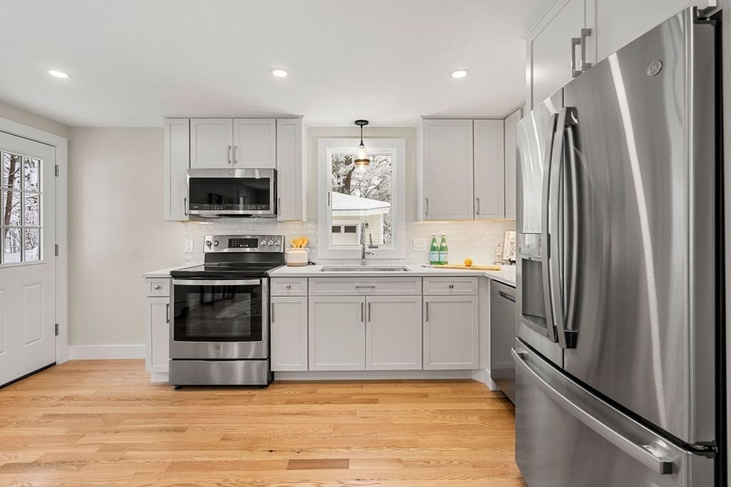 Interior, Kitchen, Pendant Lights, Recessed Lighting, Stainless Steel Appliances, Wood Texture Flooring