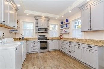 Interior, Kitchen, Recessed Lighting, Stainless Steel Appliances, Washer, Wood Texture Flooring