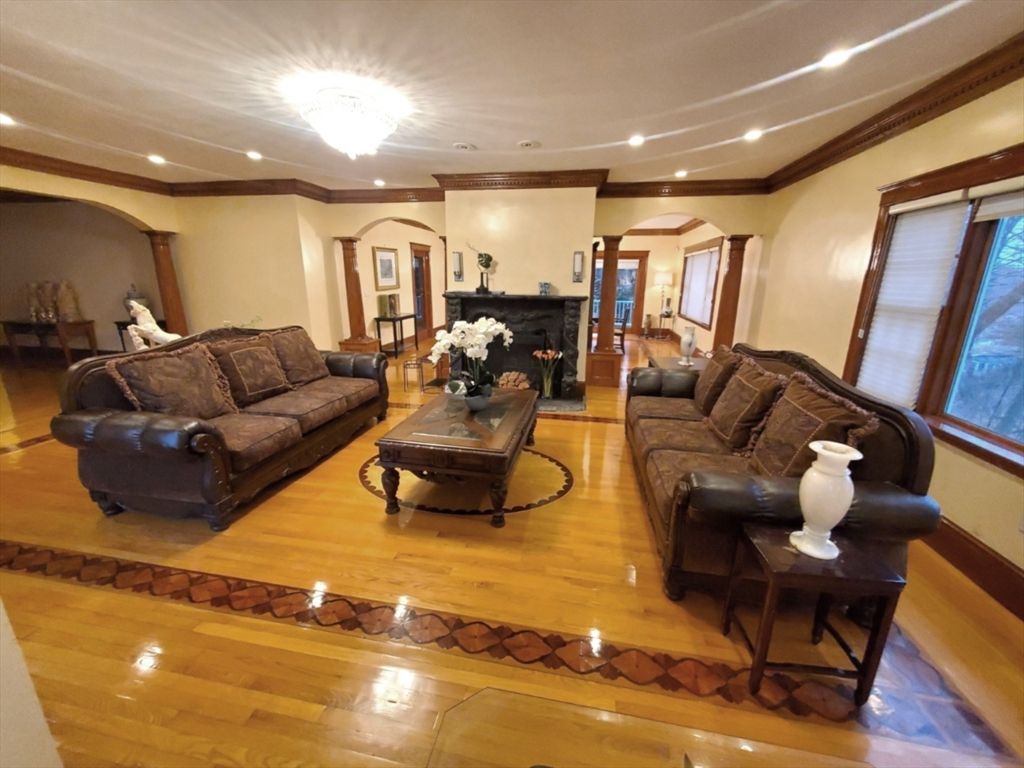 Chandelier, Fireplace, Interior, Living room, Recessed Lighting, Wood Texture Flooring