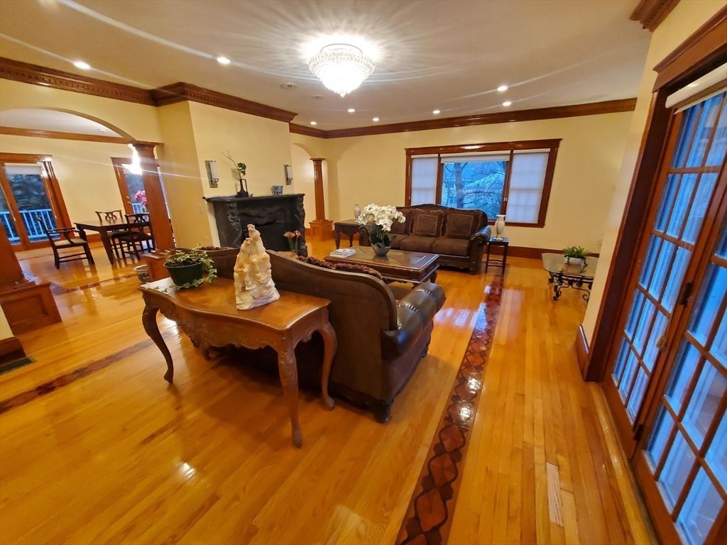 Chandelier, Dining room, Fireplace, Interior, Living room, Recessed Lighting, Wood Texture Flooring