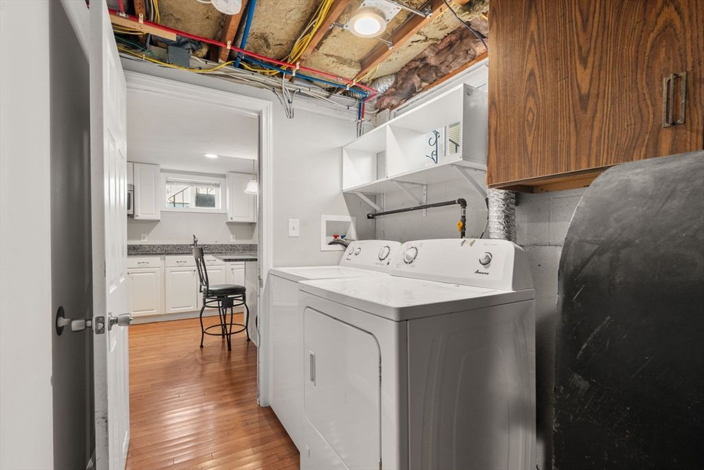 Interior, Kitchen, Recessed Lighting, Washer, Wood Texture Flooring