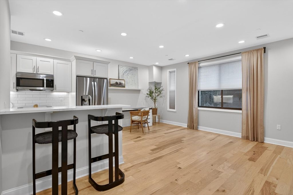 Dining room, Interior, Kitchen, Recessed Lighting, Stainless Steel Appliances, Wood Texture Flooring
