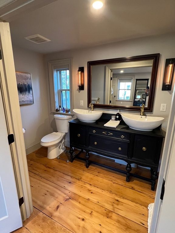 Bathroom, Dual Sink Vanities, Interior, Recessed Lighting, Wood Texture Flooring