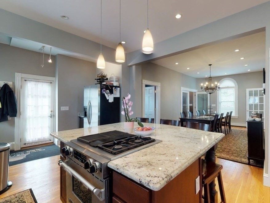 Chandelier, Dining room, Interior, Kitchen, Pendant Lights, Recessed Lighting, Stainless Steel Appliances, Wood Texture Flooring