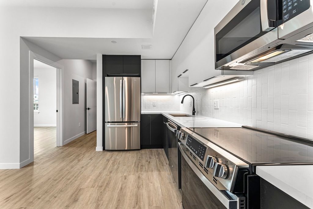 Interior, Kitchen, Recessed Lighting, Stainless Steel Appliances, Wood Texture Flooring