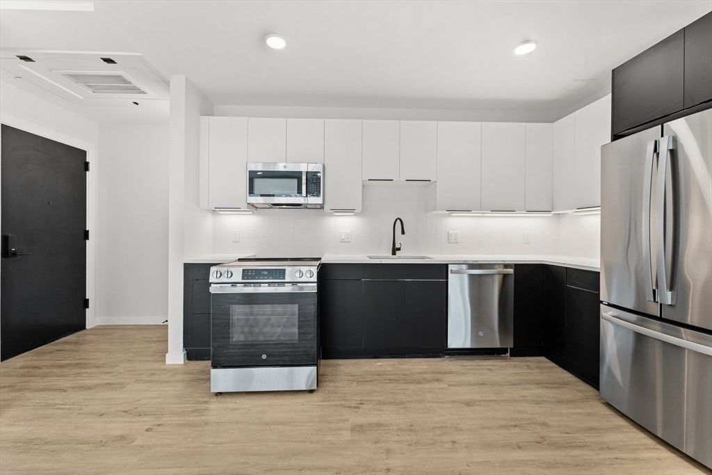 Interior, Kitchen, Recessed Lighting, Stainless Steel Appliances, Wood Texture Flooring