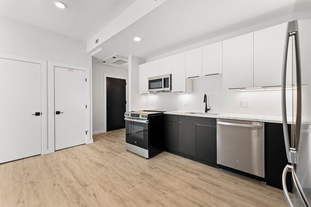 Interior, Kitchen, Recessed Lighting, Stainless Steel Appliances, Wood Texture Flooring