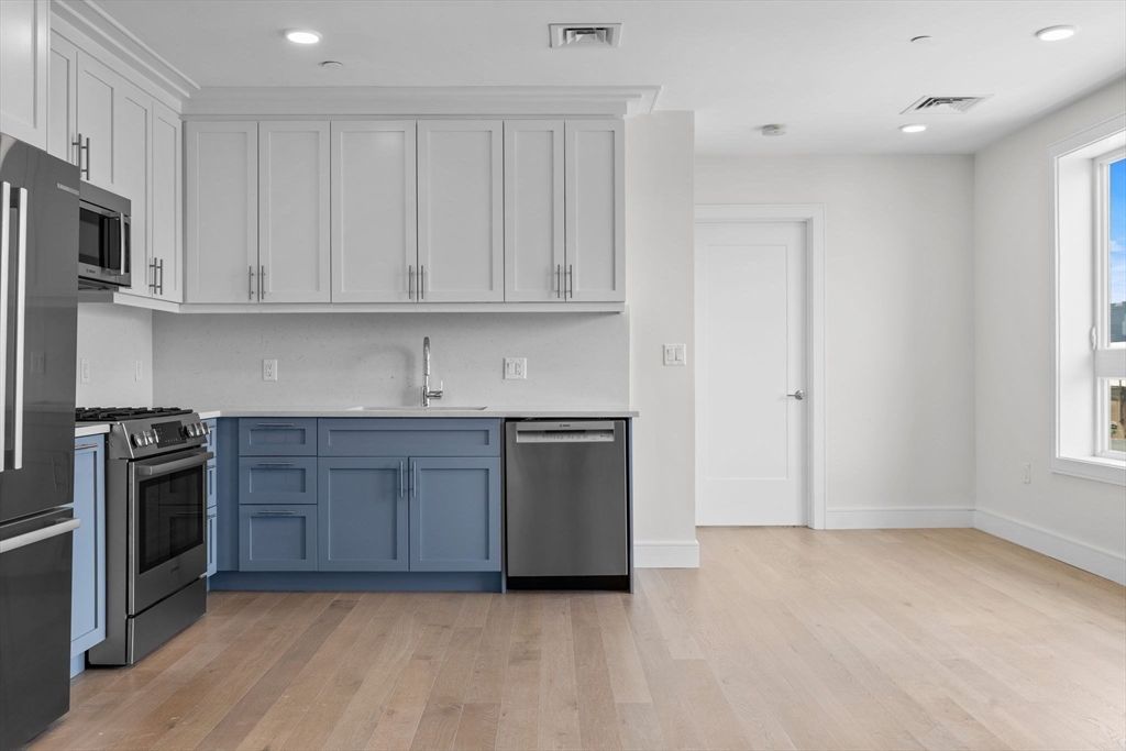 Interior, Kitchen, Recessed Lighting, Stainless Steel Appliances, Wood Texture Flooring