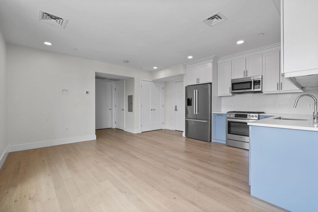 Interior, Kitchen, Recessed Lighting, Stainless Steel Appliances, Wood Texture Flooring