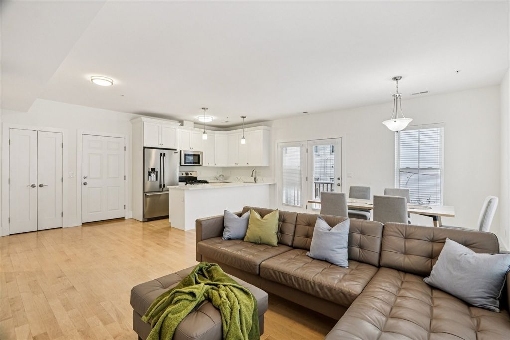 Dining room, Interior, Kitchen, Living room, Pendant Lights, Recessed Lighting, Stainless Steel Appliances, Wood Texture Flooring