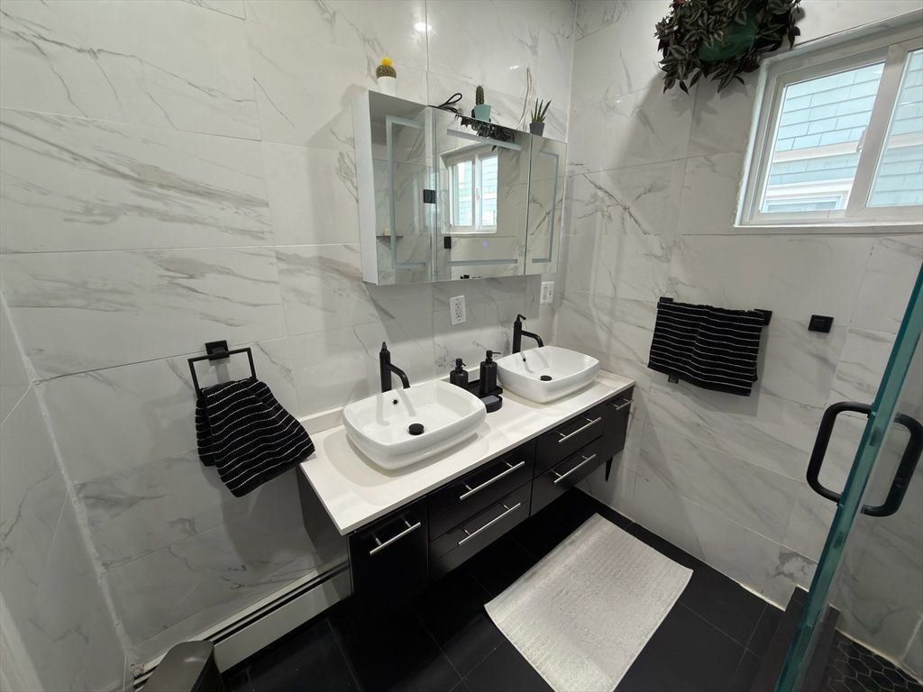 Bathroom, Dual Sink Vanities, Glass Shower, Interior, Marble Walls