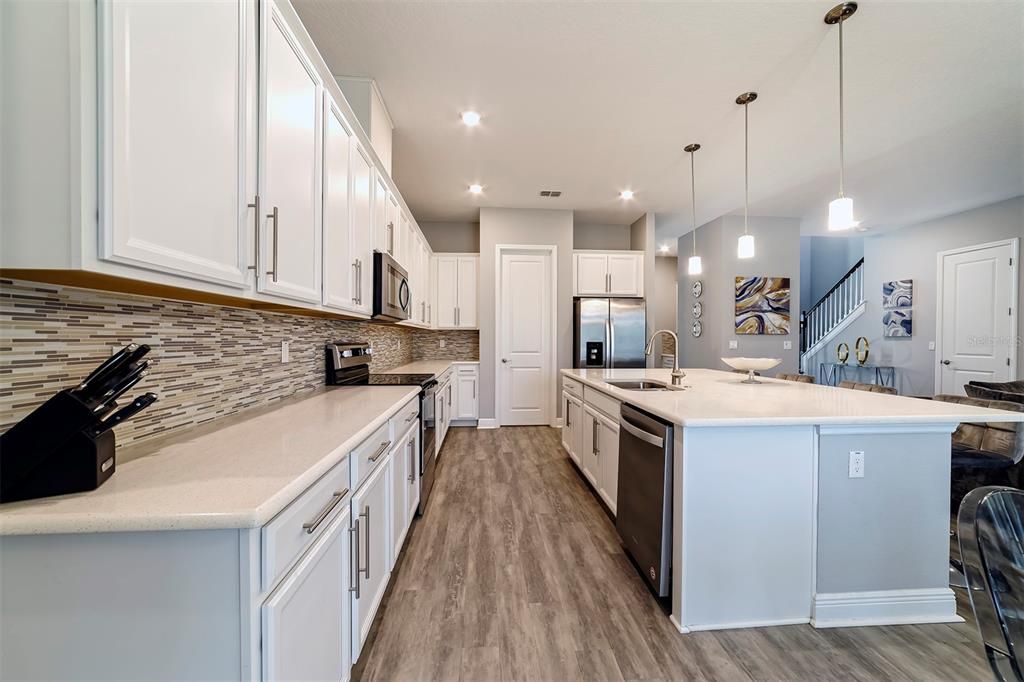 Interior, Kitchen, Pendant Lights, Recessed Lighting, Stainless Steel Appliances, Wood Texture Flooring