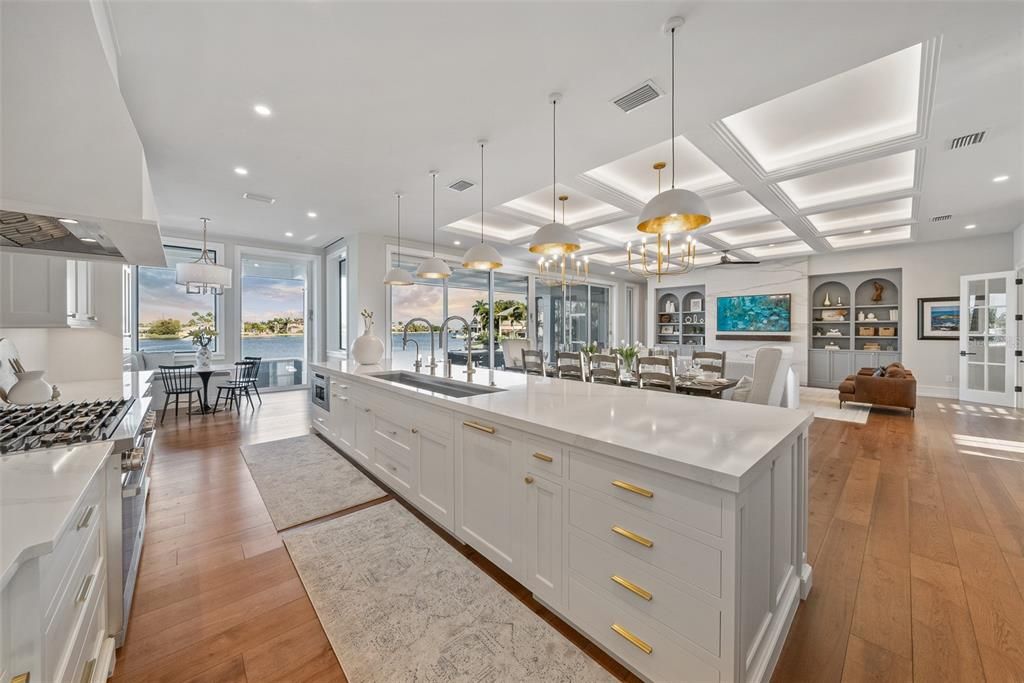 Dining room, Interior, Kitchen, Pendant Lights, Recessed Lighting, Stainless Steel Appliances, Water, Wood Texture Flooring