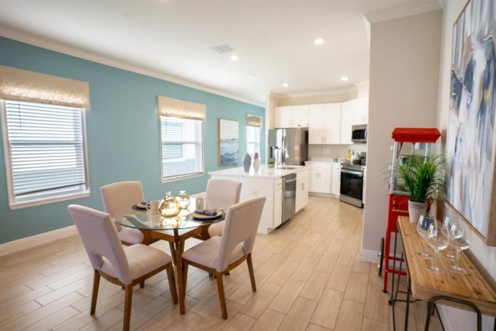 Dining room, Interior, Kitchen, Recessed Lighting, Stainless Steel Appliances, Wood Texture Flooring