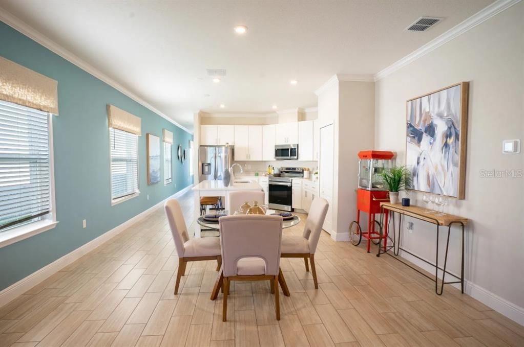 Dining room, Interior, Kitchen, Recessed Lighting, Stainless Steel Appliances, Wood Texture Flooring