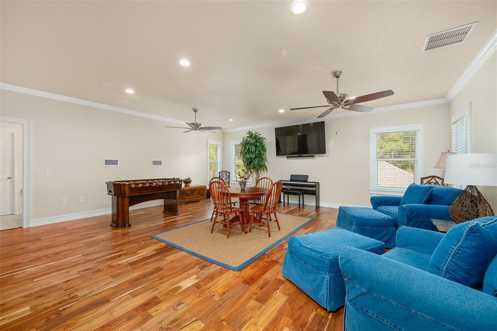 Dining room, Game Room, Interior, Living room, Piano, Recessed Lighting, Wood Texture Flooring