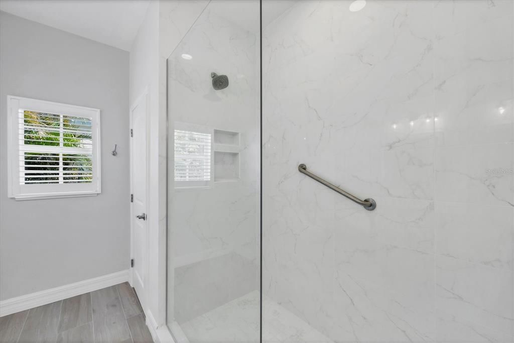 Bathroom, Glass Shower, Interior, Marble Walls, Wood Texture Flooring
