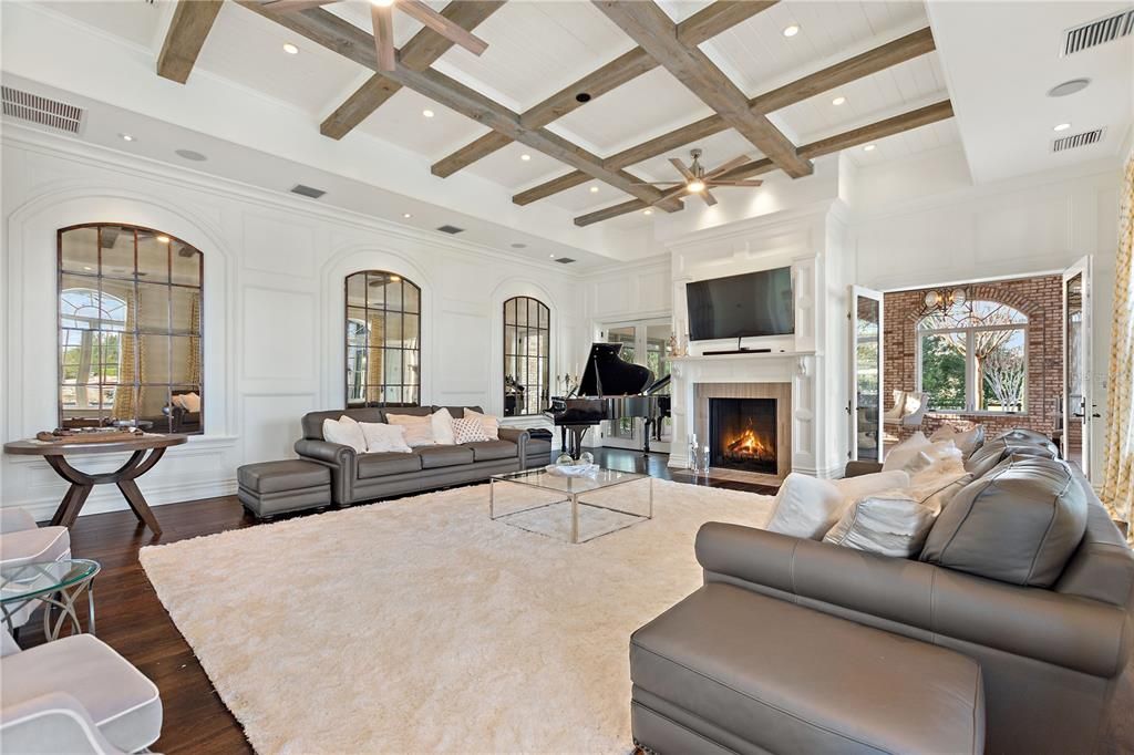 Fireplace, Interior, Living room, Piano, Recessed Lighting, Wooden Beams, Wood Texture Flooring