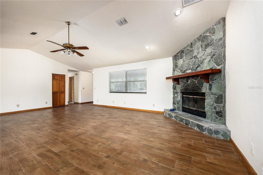 Empty room, Fireplace, Interior, Recessed Lighting, Wood Texture Flooring