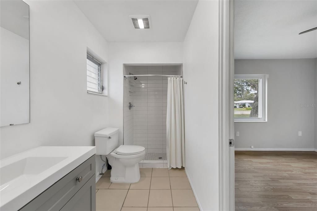 Bathroom, Glass Shower, Interior, Wood Texture Flooring