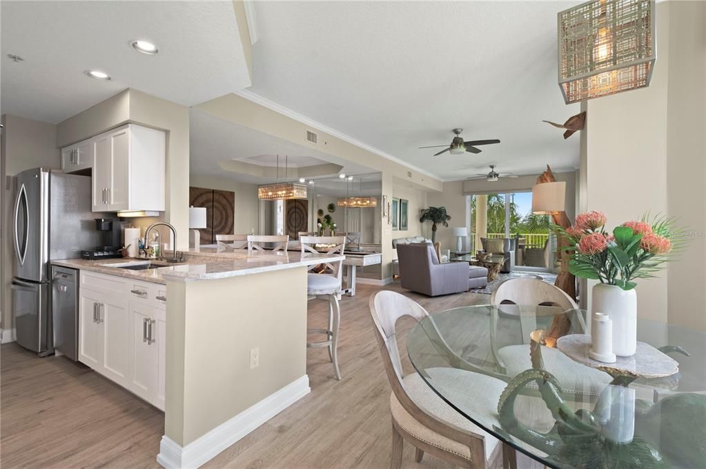 Dining room, Interior, Kitchen, Living room, Pendant Lights, Recessed Lighting, Stainless Steel Appliances, Wood Texture Flooring