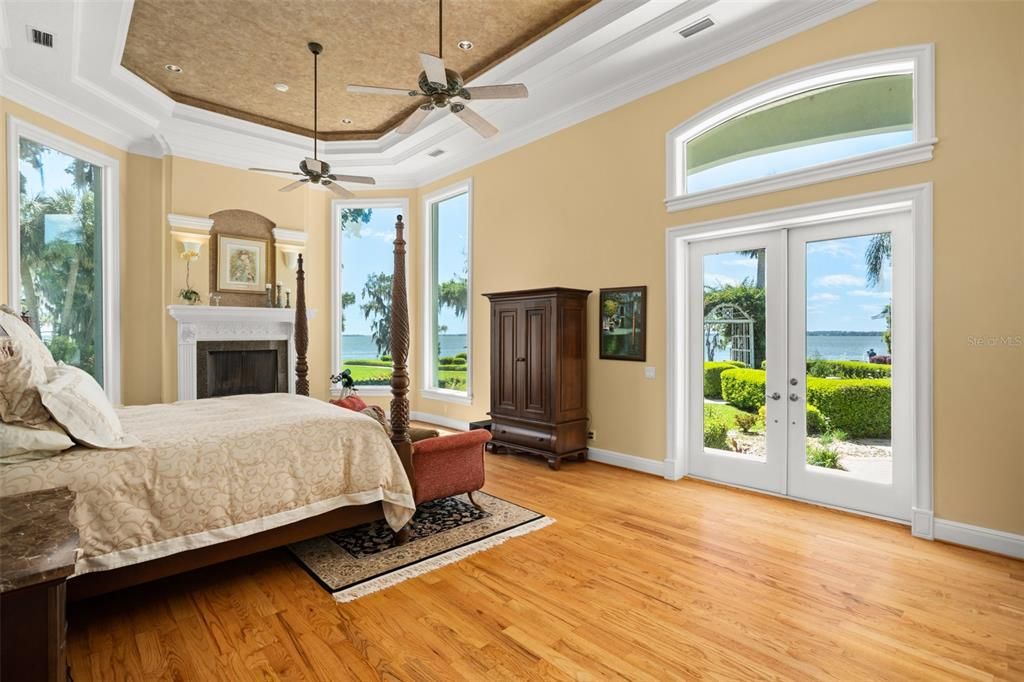 Bedroom, Fireplace, Interior, Recessed Lighting, Water, Wood Texture Flooring