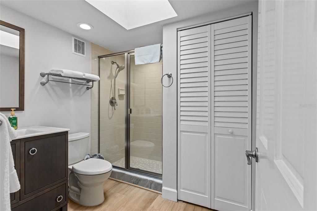 Bathroom, Glass Shower, Interior, Recessed Lighting, Wood Texture Flooring