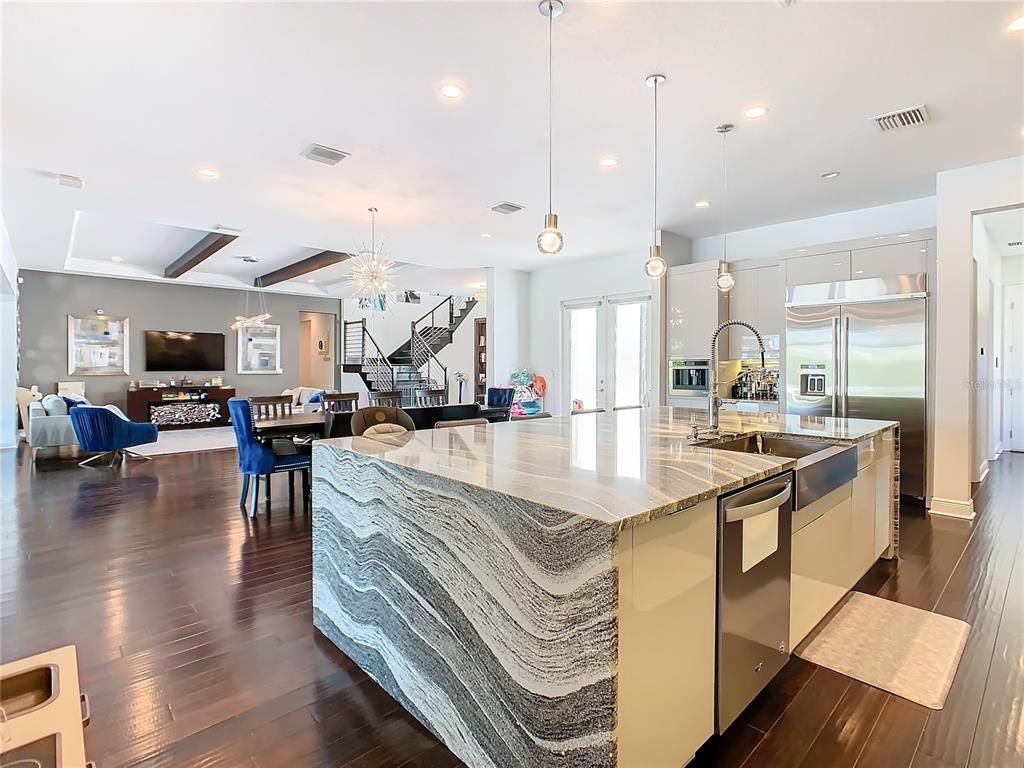Dining room, Interior, Kitchen, Living room, Pendant Lights, Recessed Lighting, Stainless Steel Appliances, Wood Texture Flooring