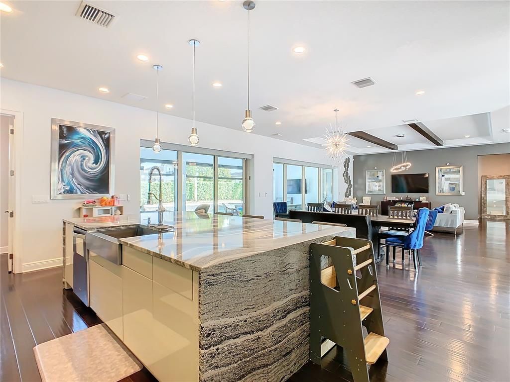 Dining room, Interior, Kitchen, Living room, Pendant Lights, Recessed Lighting, Stainless Steel Appliances, Wooden Beams, Wood Texture Flooring